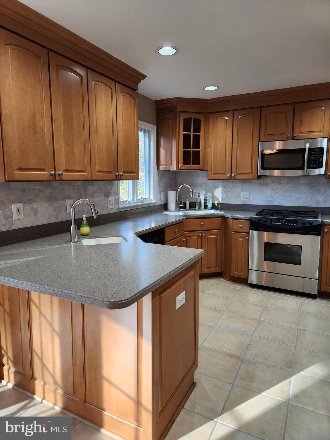 8230 Riverside Road Alexandria, VA 22308 - Photo 10 of 49 Stainless appliances, under cabinet lights