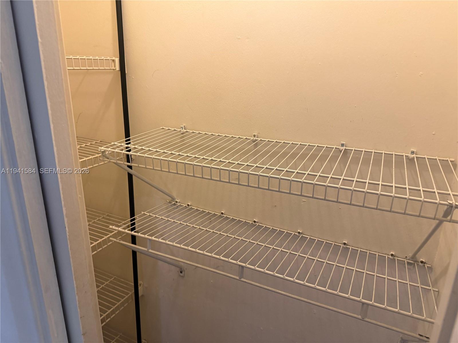 8620 Southwest 149th Avenue, Unit 416 Miami, FL 33193 - Photo 7 of 21 a view of a room with rack