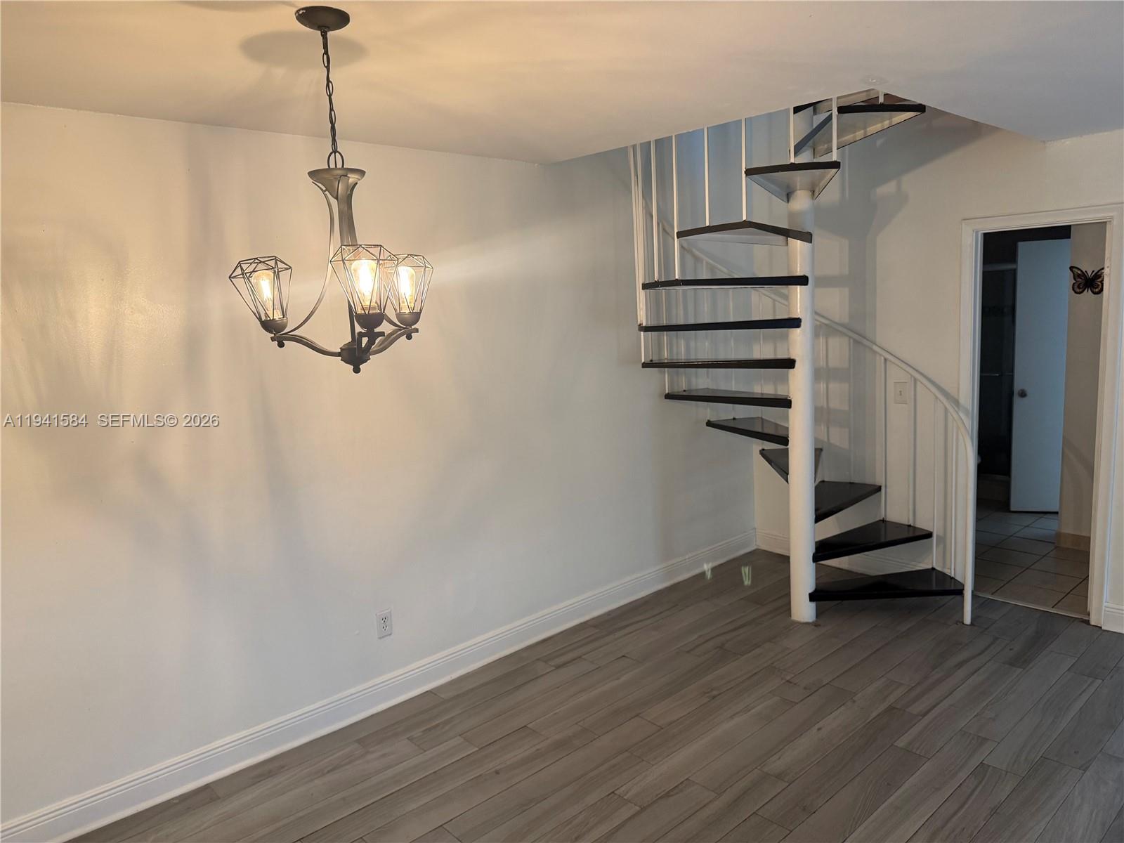 8620 Southwest 149th Avenue, Unit 416 Miami, FL 33193 - Photo 8 of 21 a view of entryway with wooden floor