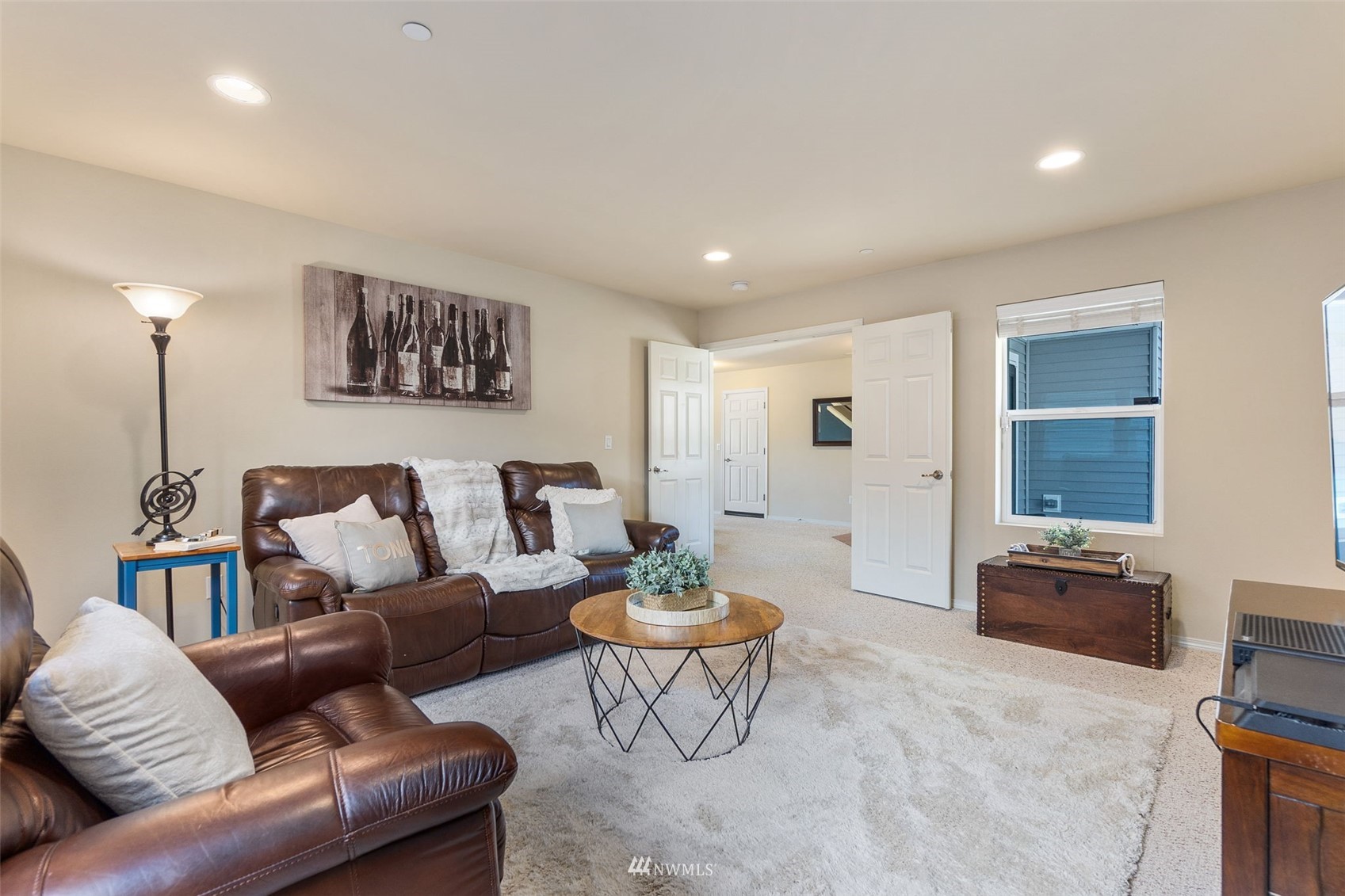 1175 Swan Loop DuPont, WA 98327 - Photo 11 of 33 a living room with furniture a rug and a table