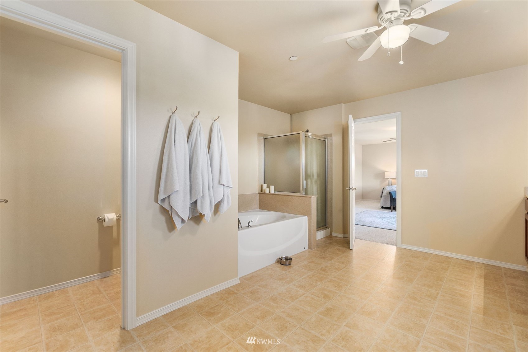 1175 Swan Loop DuPont, WA 98327 - Photo 23 of 33 a bathroom with a bathtub and shower