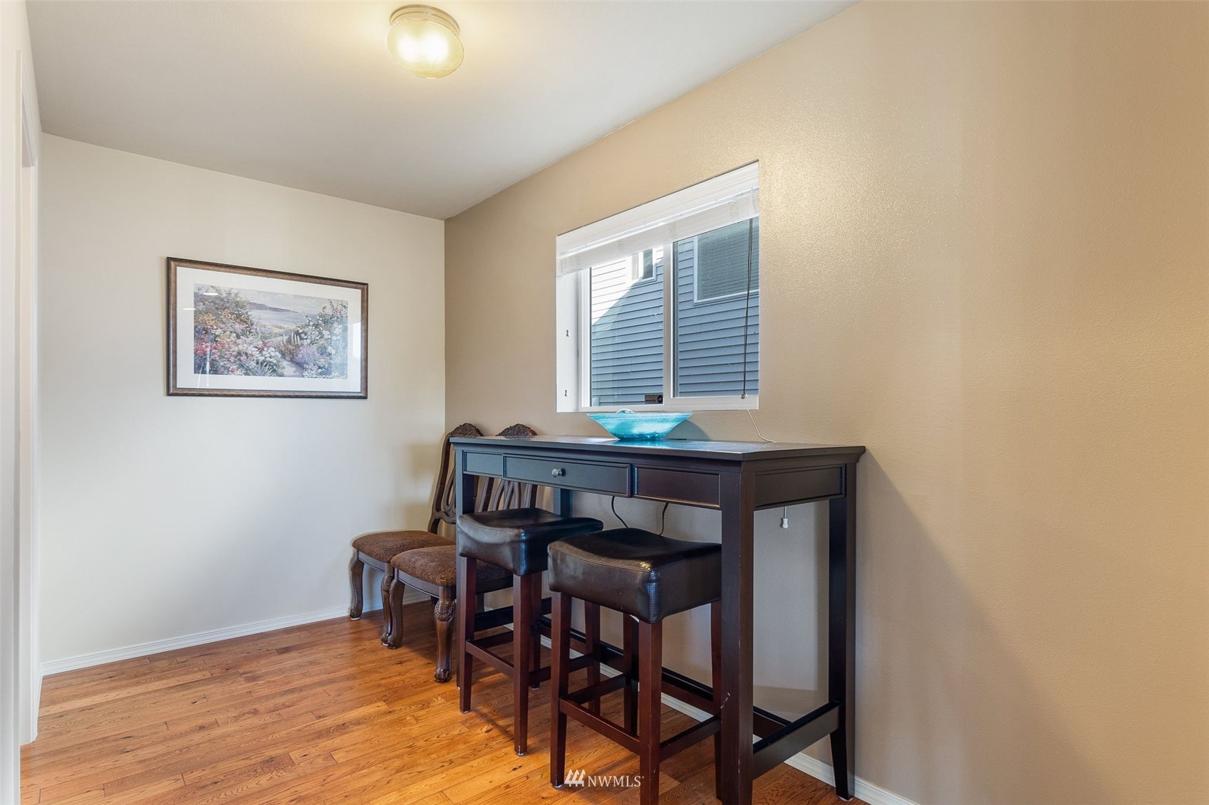1175 Swan Loop DuPont, WA 98327 - Photo 10 of 33 a dining room with furniture and window