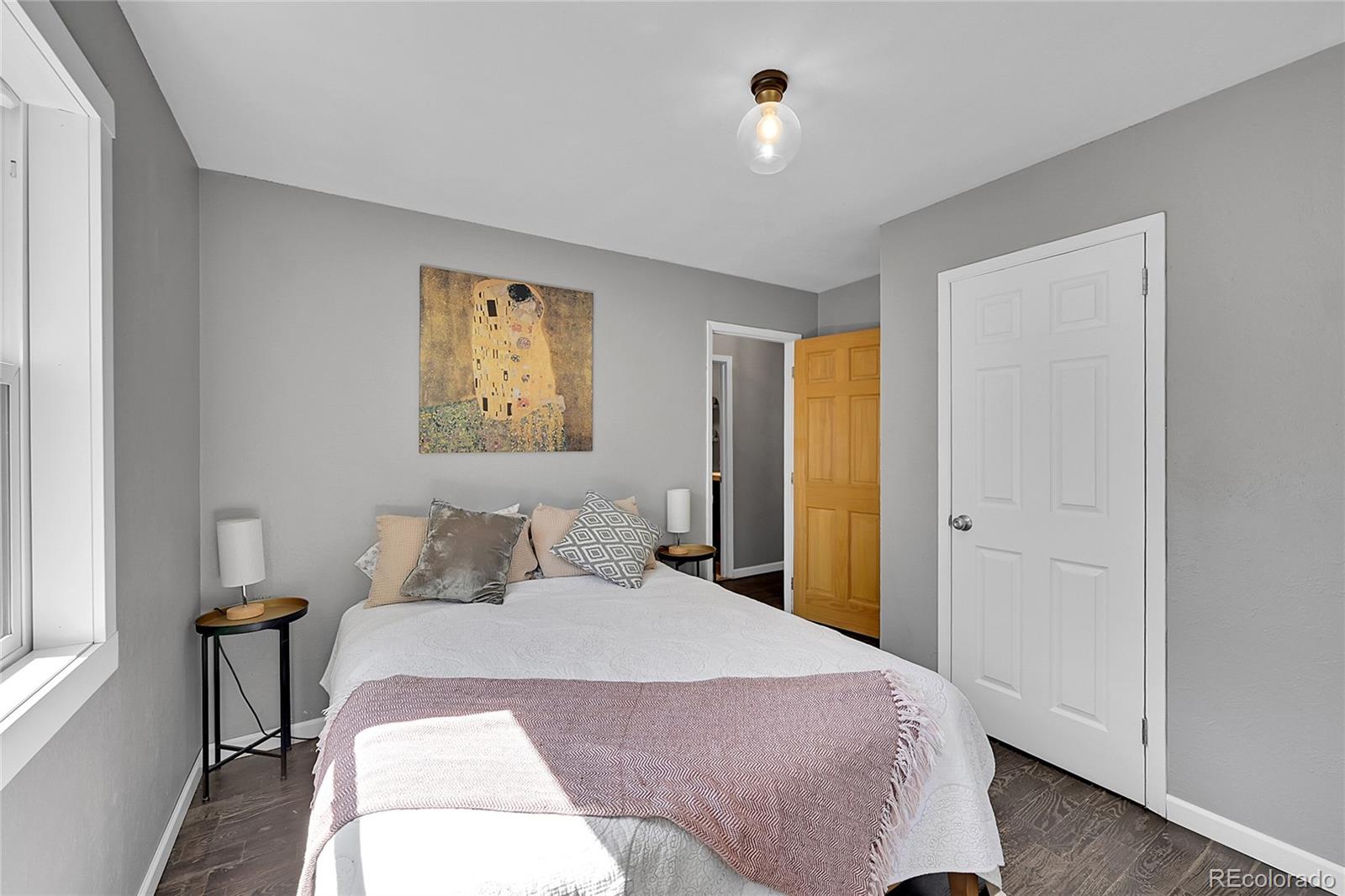 9092 South Gray Lane Conifer, CO 80433 - Photo 15 of 23 a bedroom with a bed and a window