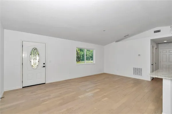 an empty room with windows