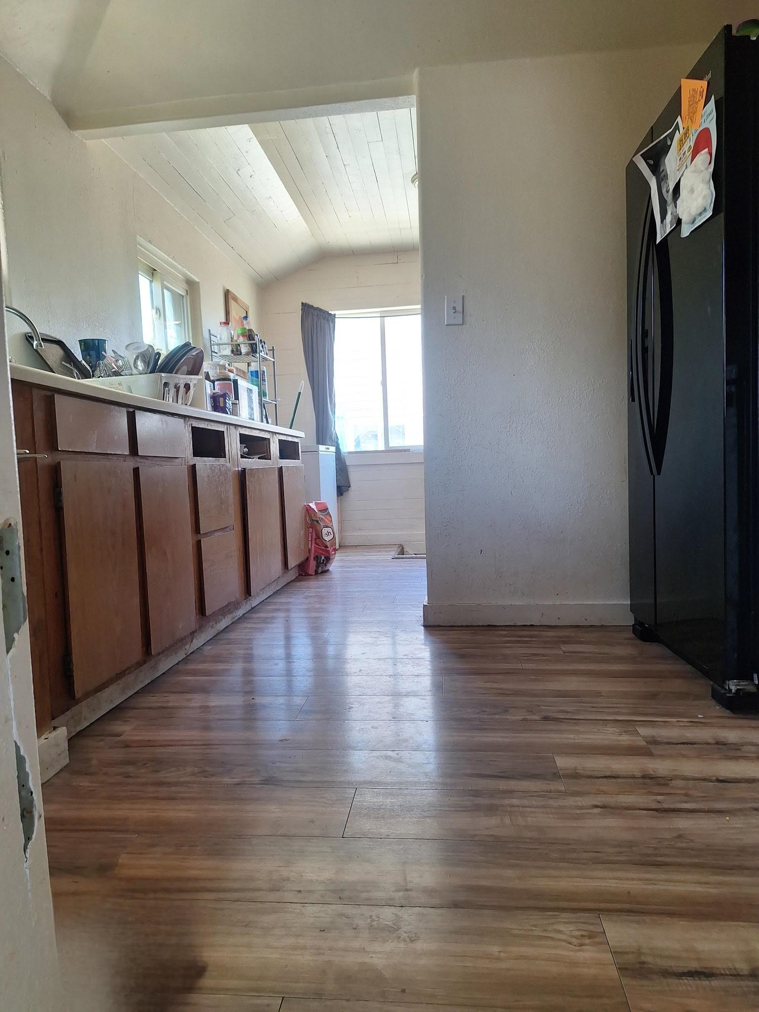 805 B Street Delta, CO 81416 - Photo 11 of 20 a view of kitchen with furniture and wooden floor
