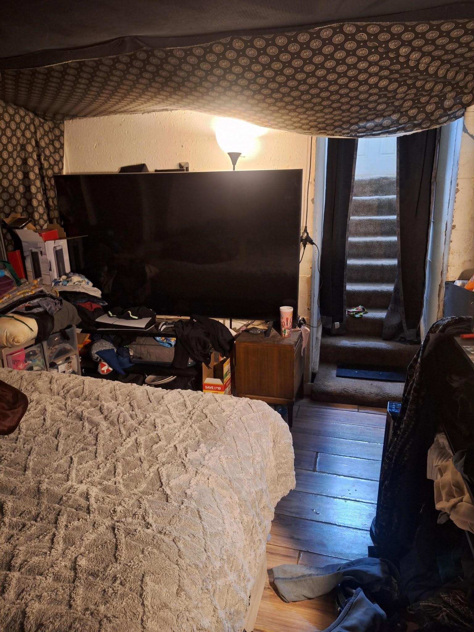 805 B Street Delta, CO 81416 - Photo 15 of 20 a room with wooden floor and furniture