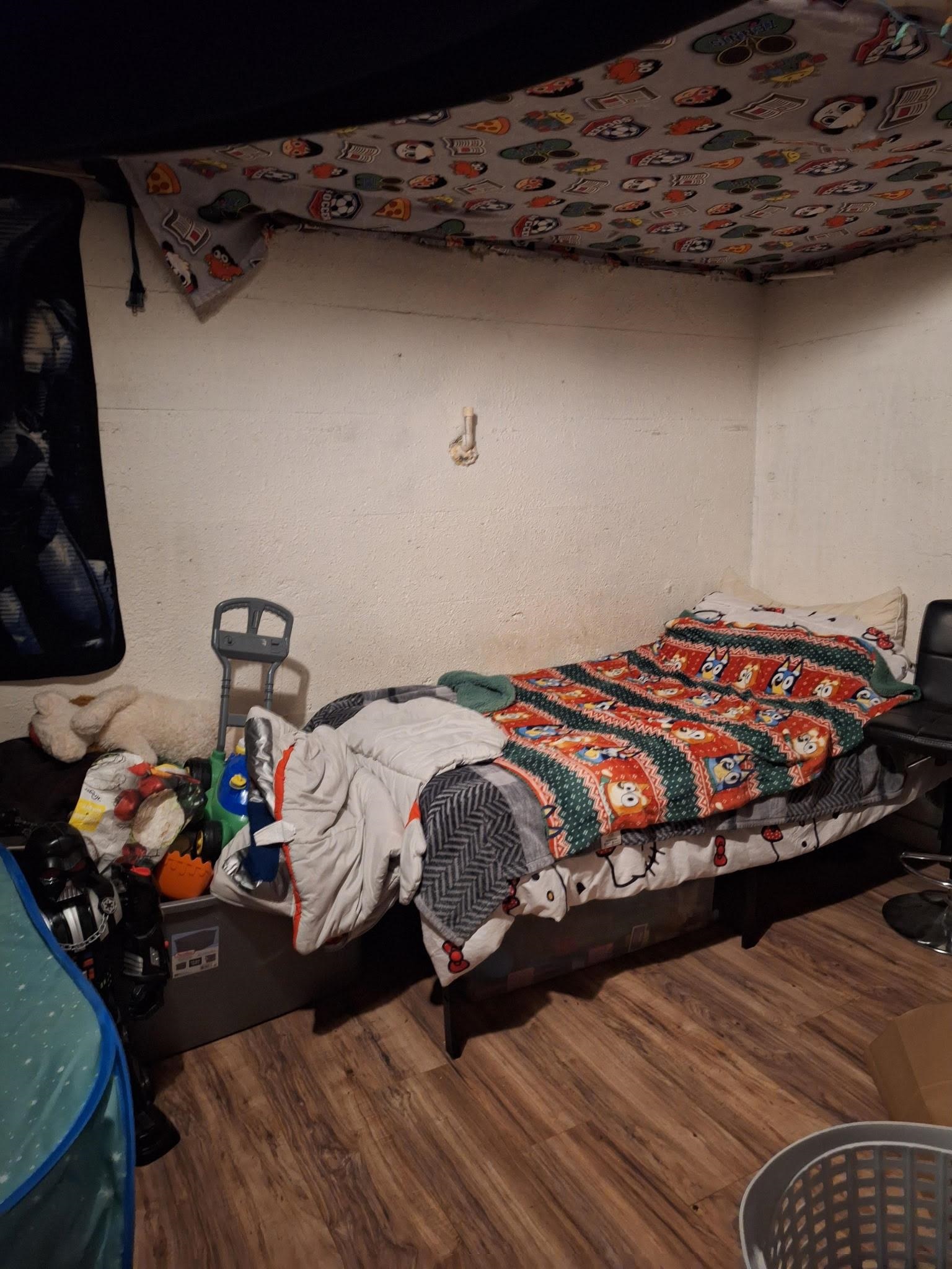 805 B Street Delta, CO 81416 - Photo 19 of 20 a bedroom with a bed and dresser