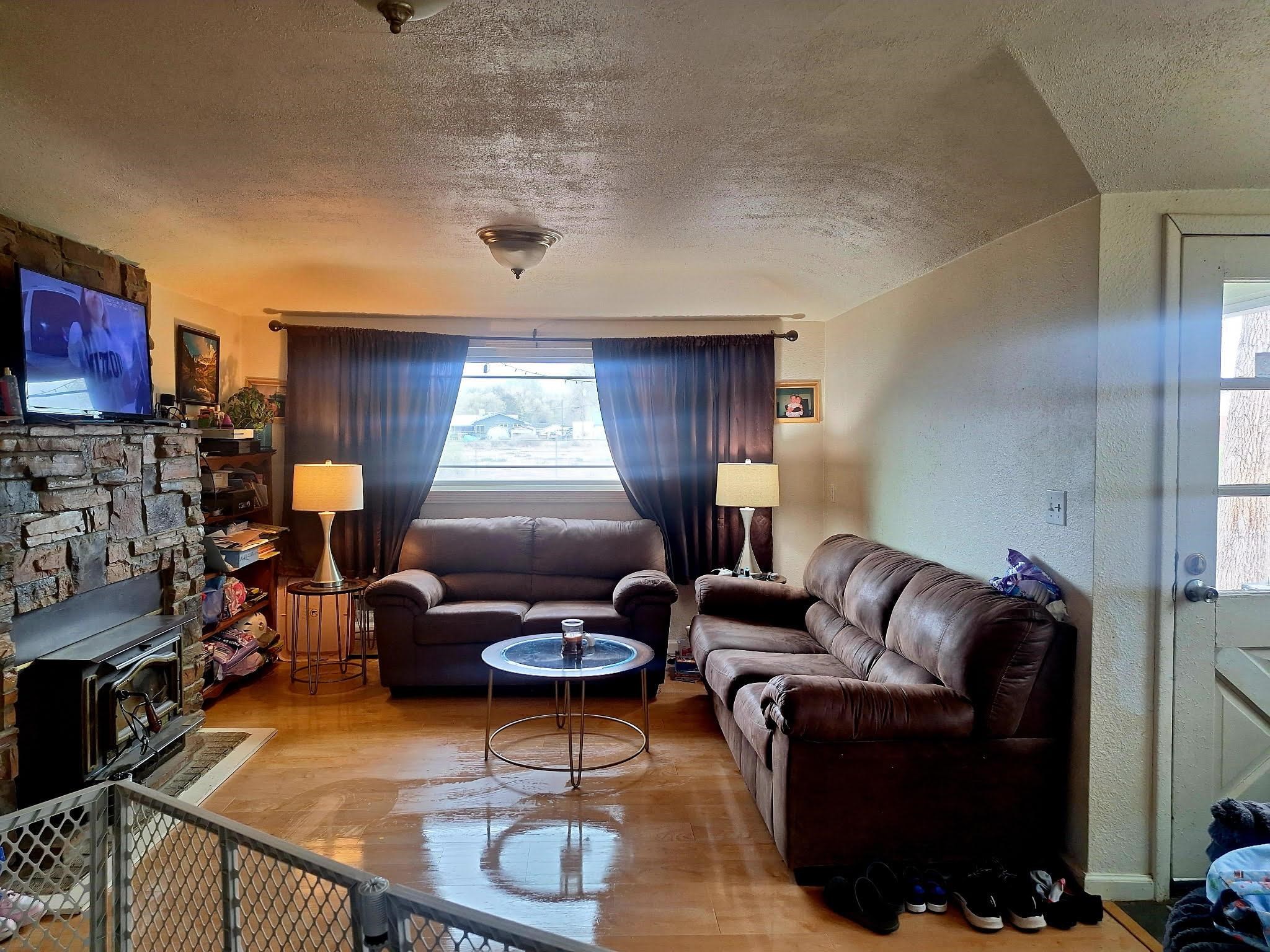 805 B Street Delta, CO 81416 - Photo 5 of 20 a living room with furniture and a window