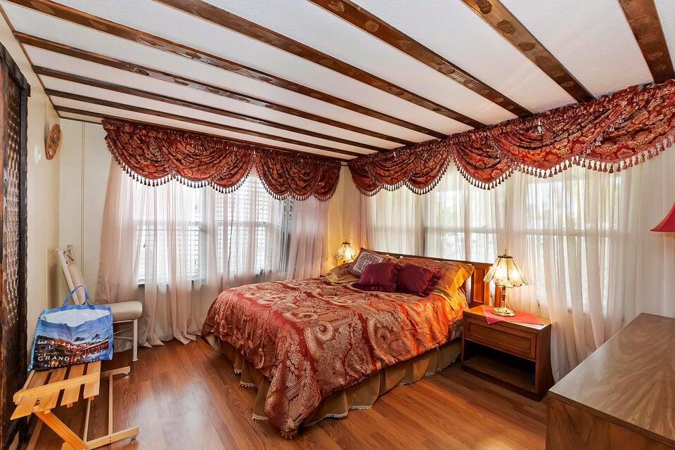 74711 Dillon Road, Unit 308 Desert Hot Springs, CA 92241 - Photo 14 of 42 a bedroom with a bed and a window