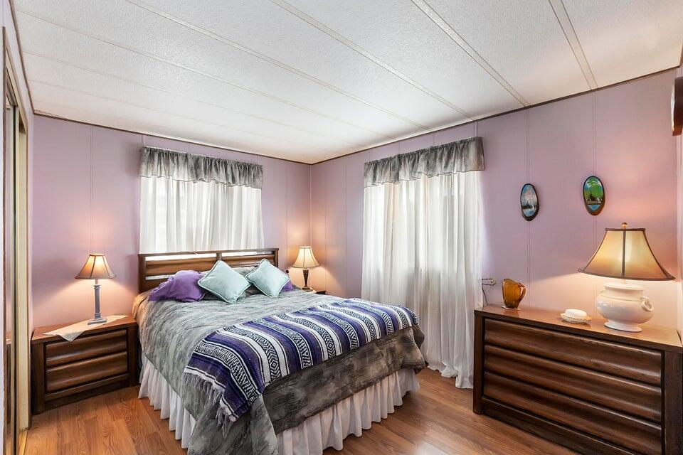 74711 Dillon Road, Unit 308 Desert Hot Springs, CA 92241 - Photo 18 of 42 a bedroom with a bed and a window