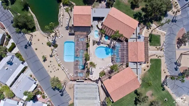 an aerial view of a swimming pool