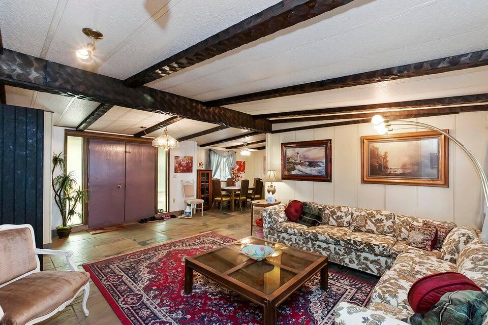 74711 Dillon Road, Unit 308 Desert Hot Springs, CA 92241 - Photo 7 of 42 a living room with furniture and window