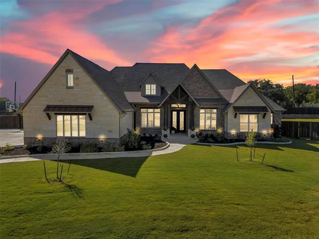 a front view of a house with swimming pool having outdoor seating