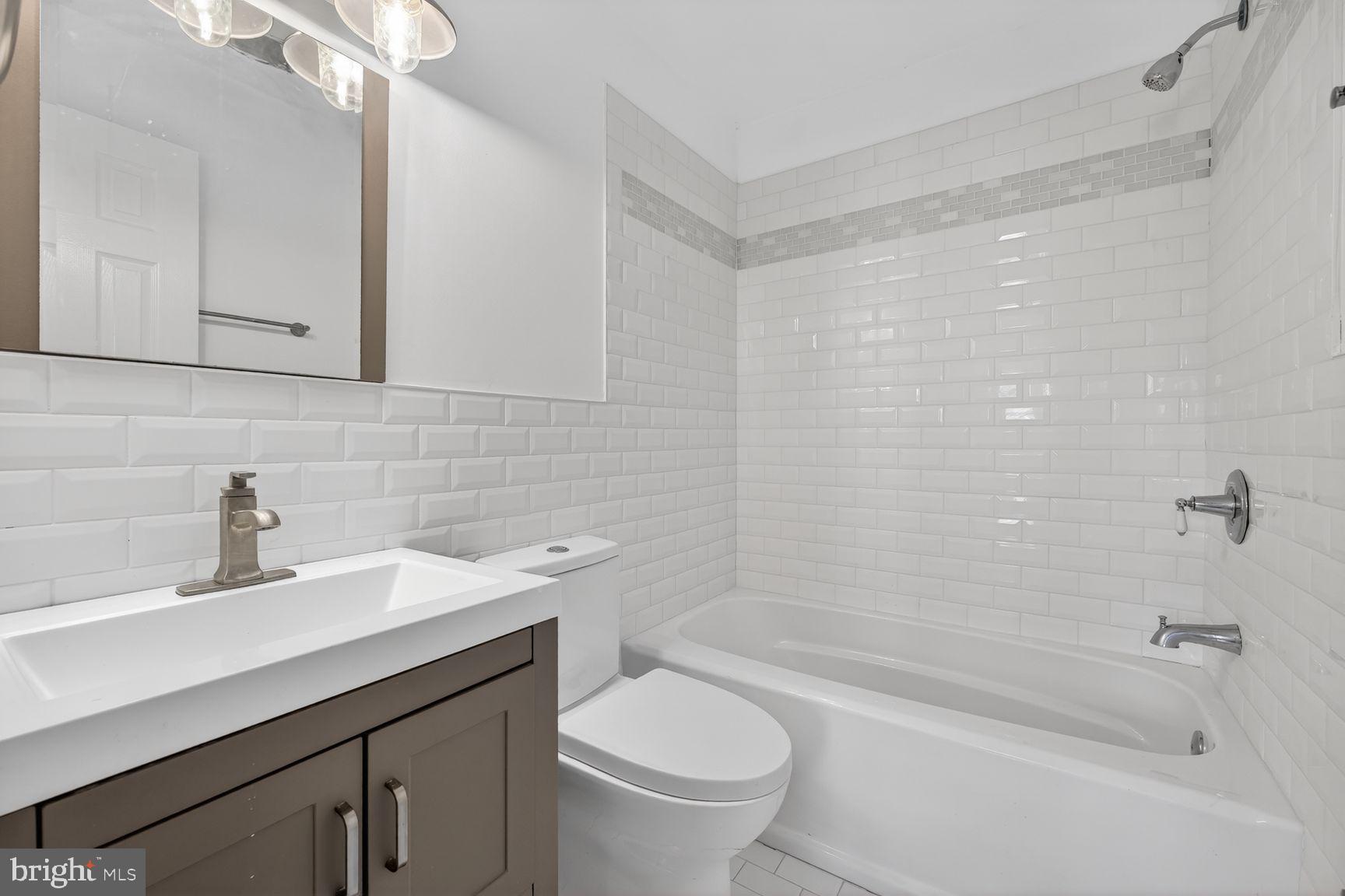 7205 Livingston Road Oxon Hill, MD 20745 - Photo 11 of 25 Modern bathroom with sleek finishes.