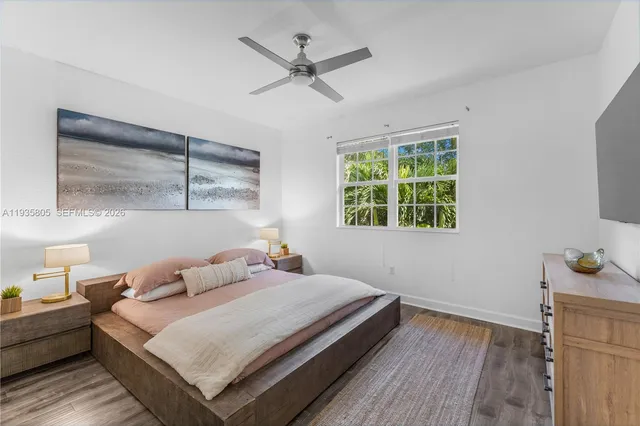 a bedroom with a bed and a walk in closet