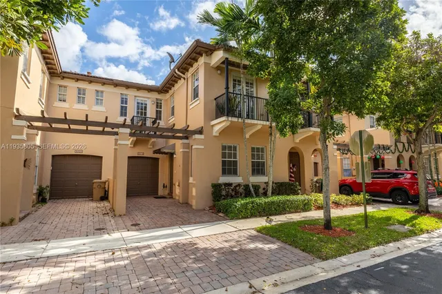 a view of a door and a window