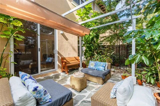 a backyard of a house with seating space