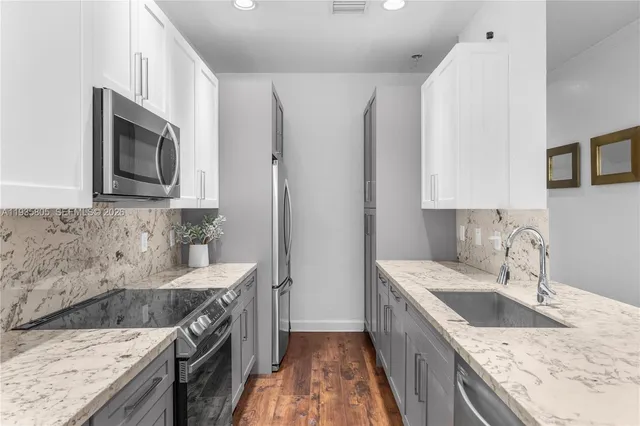 a outdoor living space with furniture and a potted plant