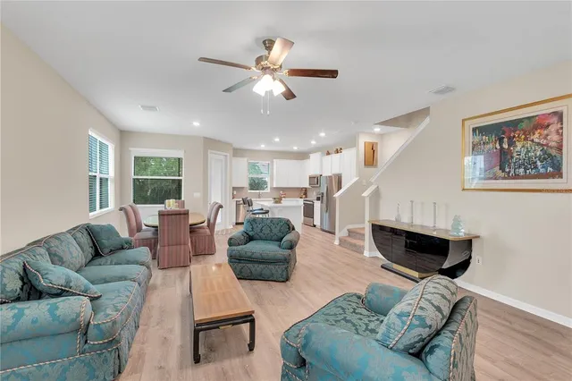 a living room with furniture and a window