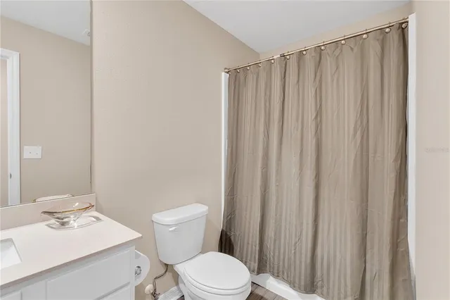 a view of livingroom with furniture and windows