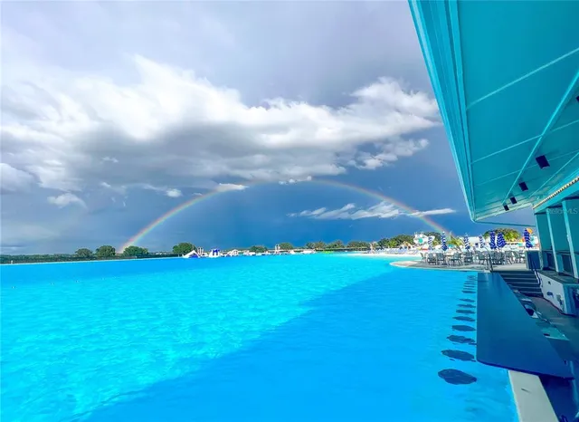 a view of house with a yard