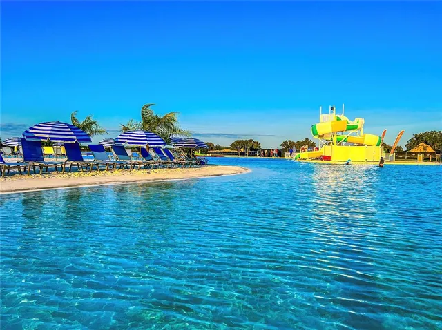 a childrens park with lots of swings and slides