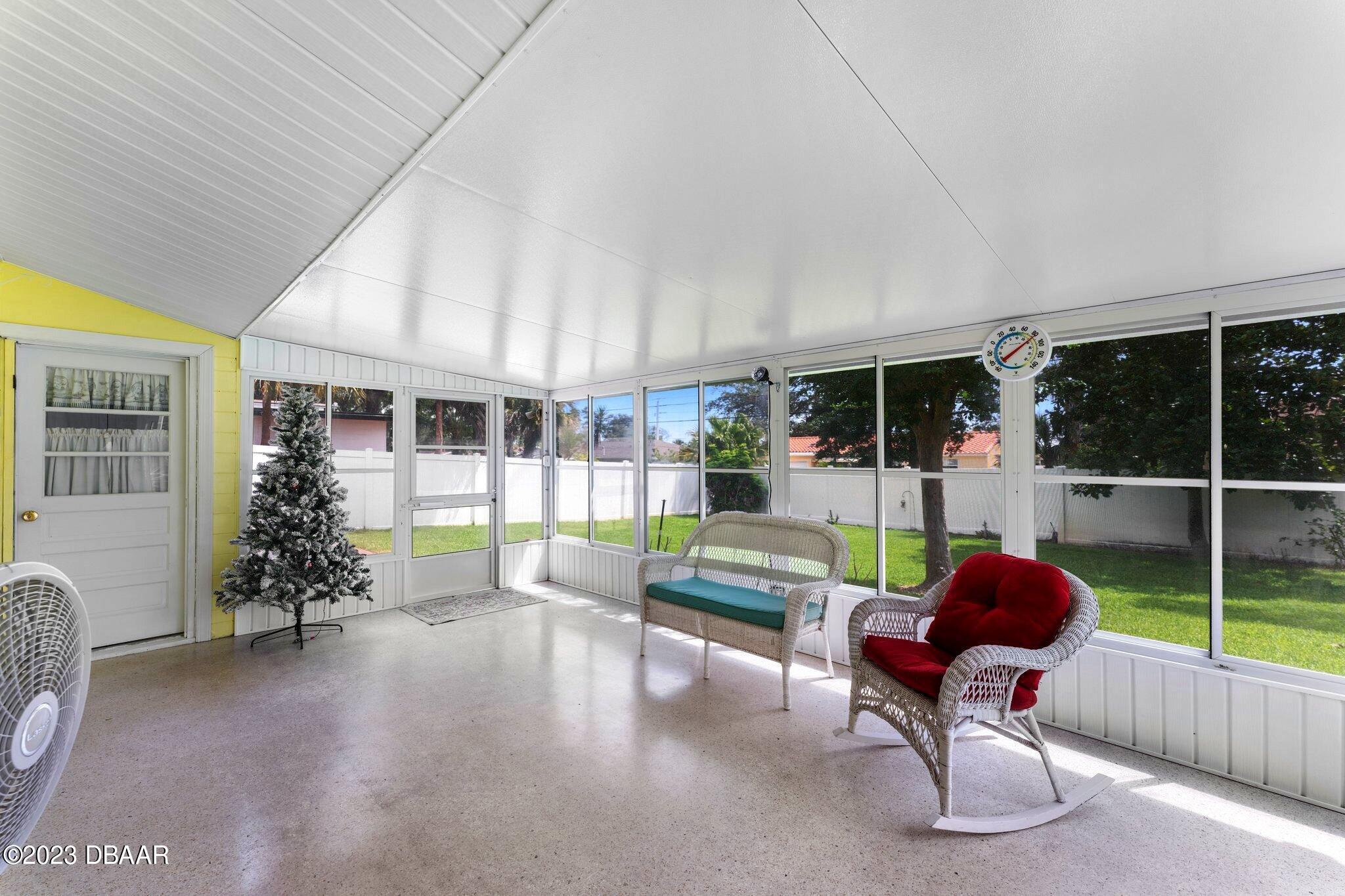 997 Parkwood Drive Ormond Beach, FL 32174 - Photo 12 of 25 997 Parkwood enclosed florida room view