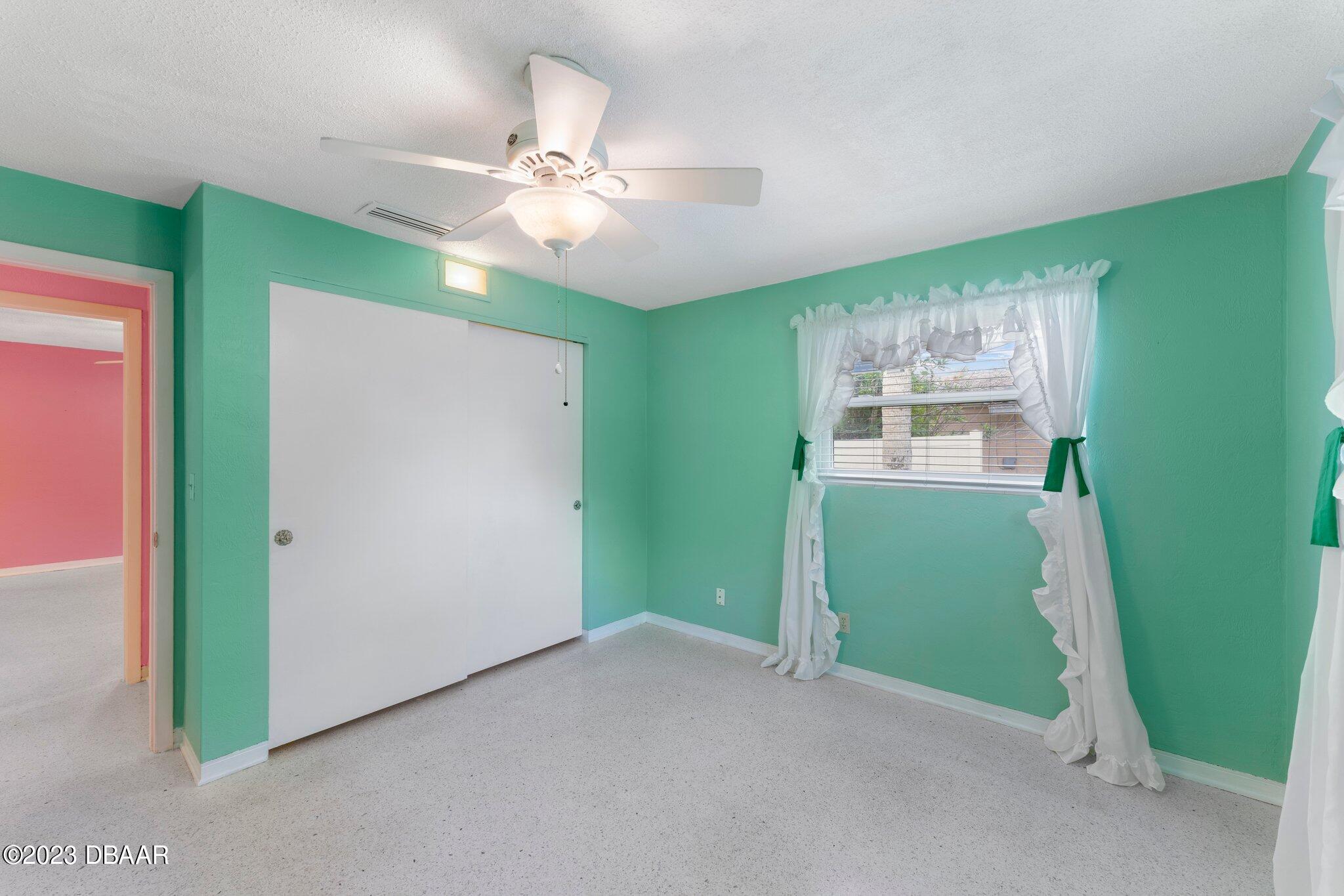 997 Parkwood Drive Ormond Beach, FL 32174 - Photo 16 of 25 997 Parkwood green guest room