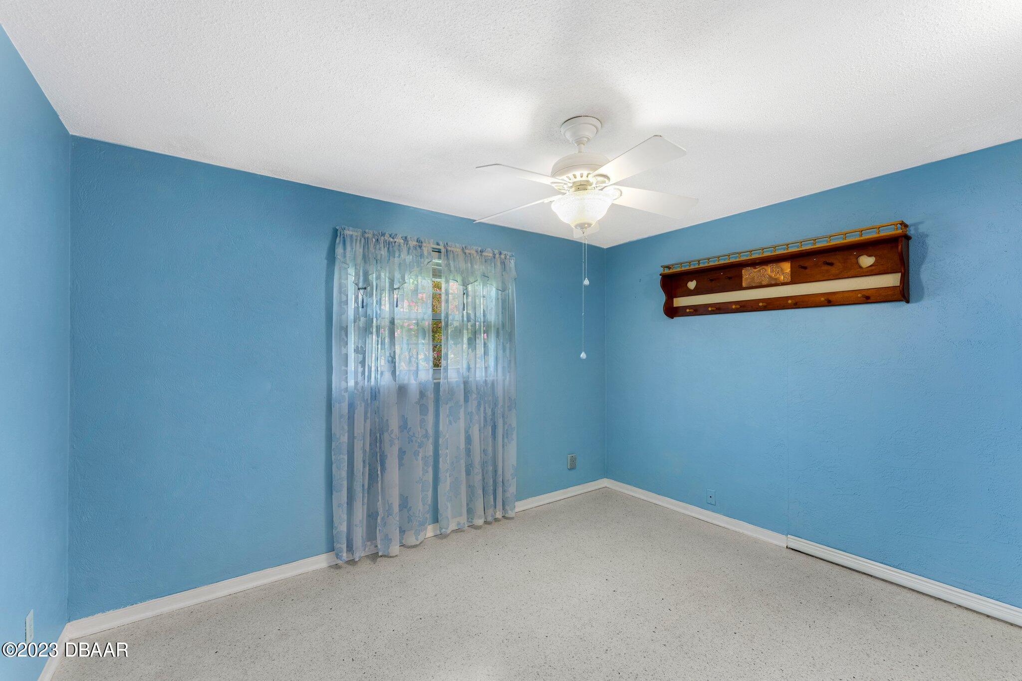 997 Parkwood Drive Ormond Beach, FL 32174 - Photo 20 of 25 997 Parkwood blue guestroom 2