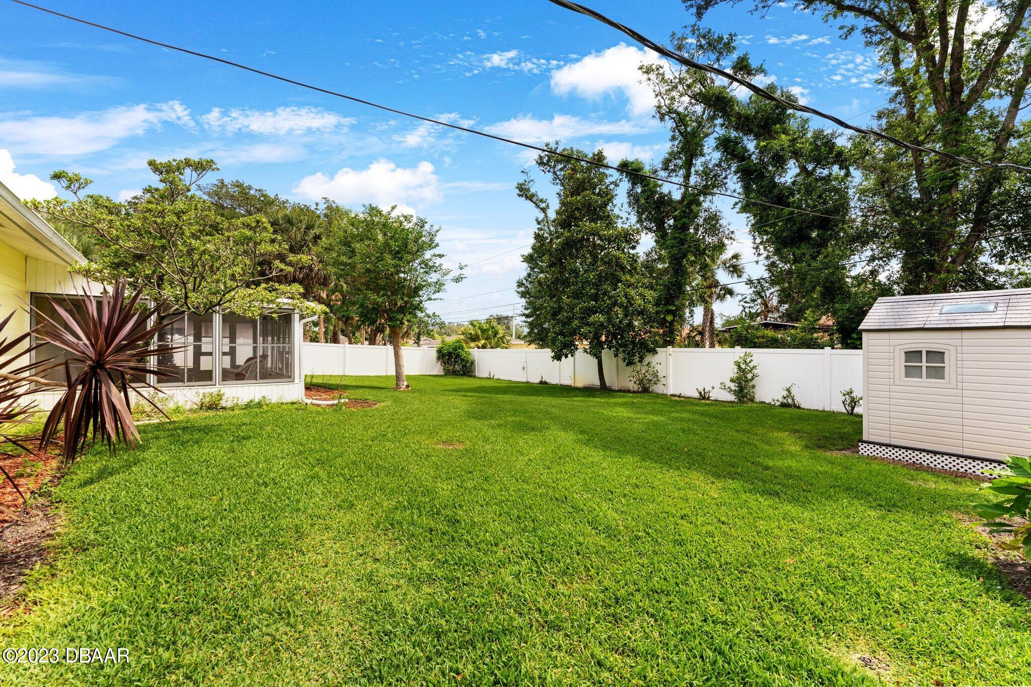 997 Parkwood Drive Ormond Beach, FL 32174 - Photo 21 of 25 997 Parkwood backyard view 2