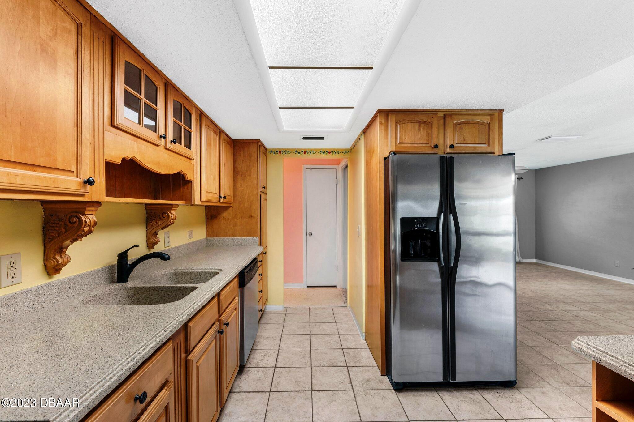 997 Parkwood Drive Ormond Beach, FL 32174 - Photo 5 of 25 997 Parkwood kitchen sink to hall