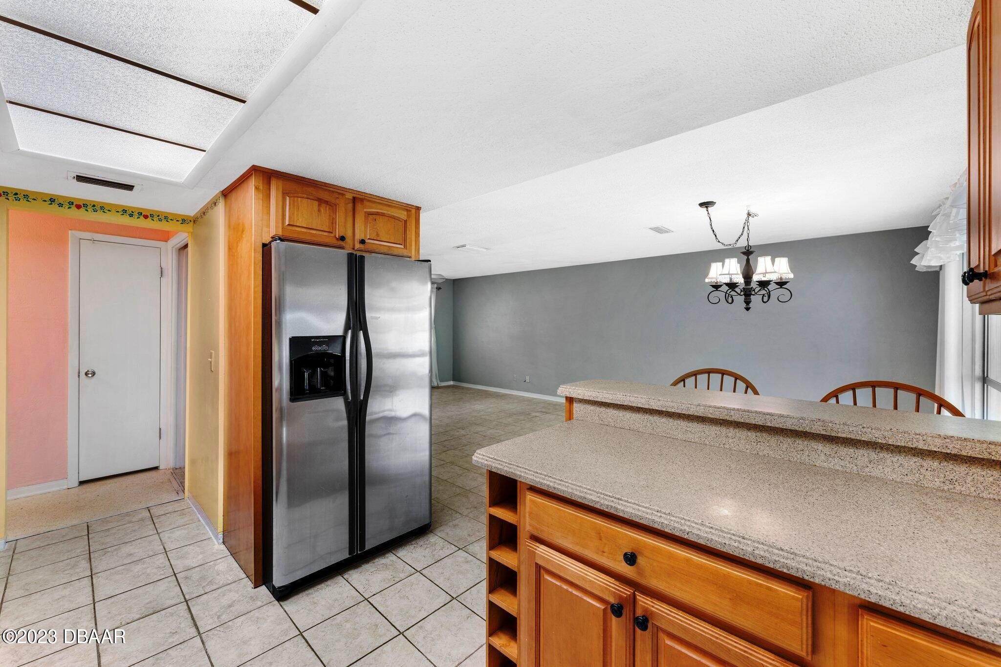 997 Parkwood Drive Ormond Beach, FL 32174 - Photo 7 of 25 997 Parkwood kitchen to dining