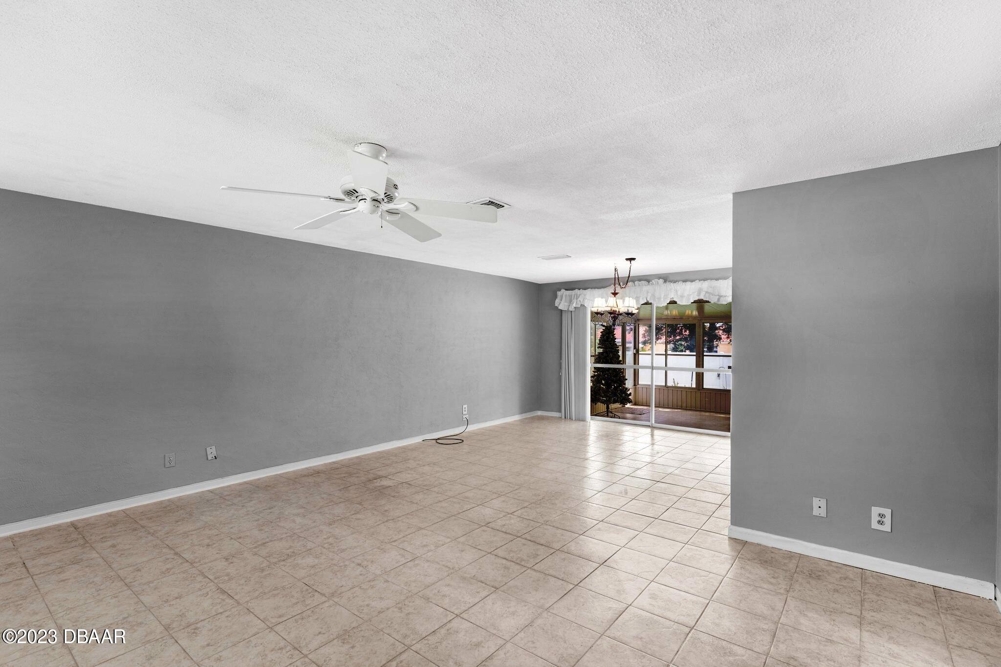 997 Parkwood Drive Ormond Beach, FL 32174 - Photo 9 of 25 997 Parkwood living to dining