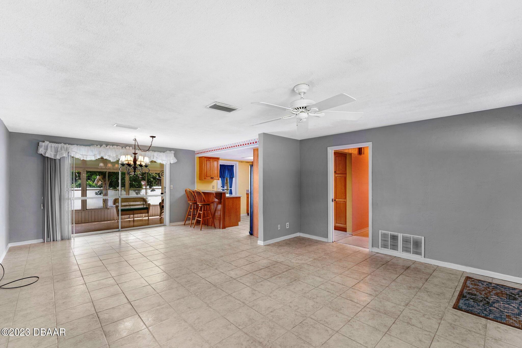 997 Parkwood Drive Ormond Beach, FL 32174 - Photo 10 of 25 997 Parkwood dining sliders to patio