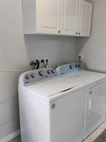 a bathroom with a toilet and a bathtub