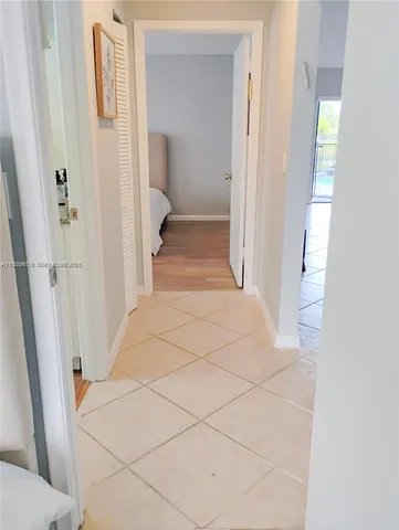 a view of a house with a backyard and a garden