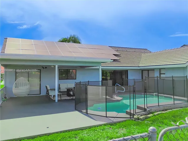 a sign on the side of the house