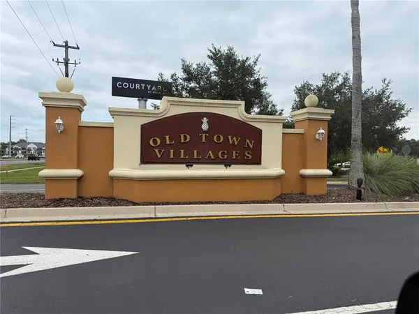 a sign on the side of a street