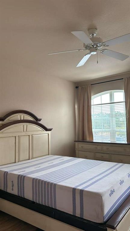260 Old Village Center Circle, Unit 8205 St. Augustine, FL 32084 - Photo 10 of 13 a bedroom with a bed and window