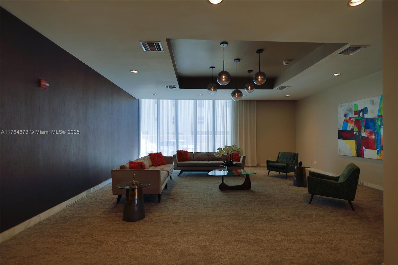 9225 Collins Avenue, Unit 503 Surfside, FL 33154 - Photo 27 of 37 a living room with furniture and a window