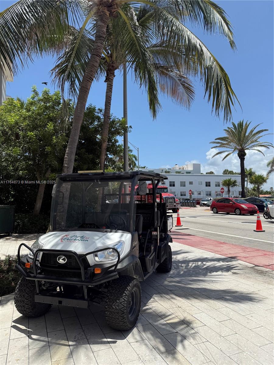 9225 Collins Avenue, Unit 503 Surfside, FL 33154 - Photo 33 of 37 a view of a car parked on the roadside