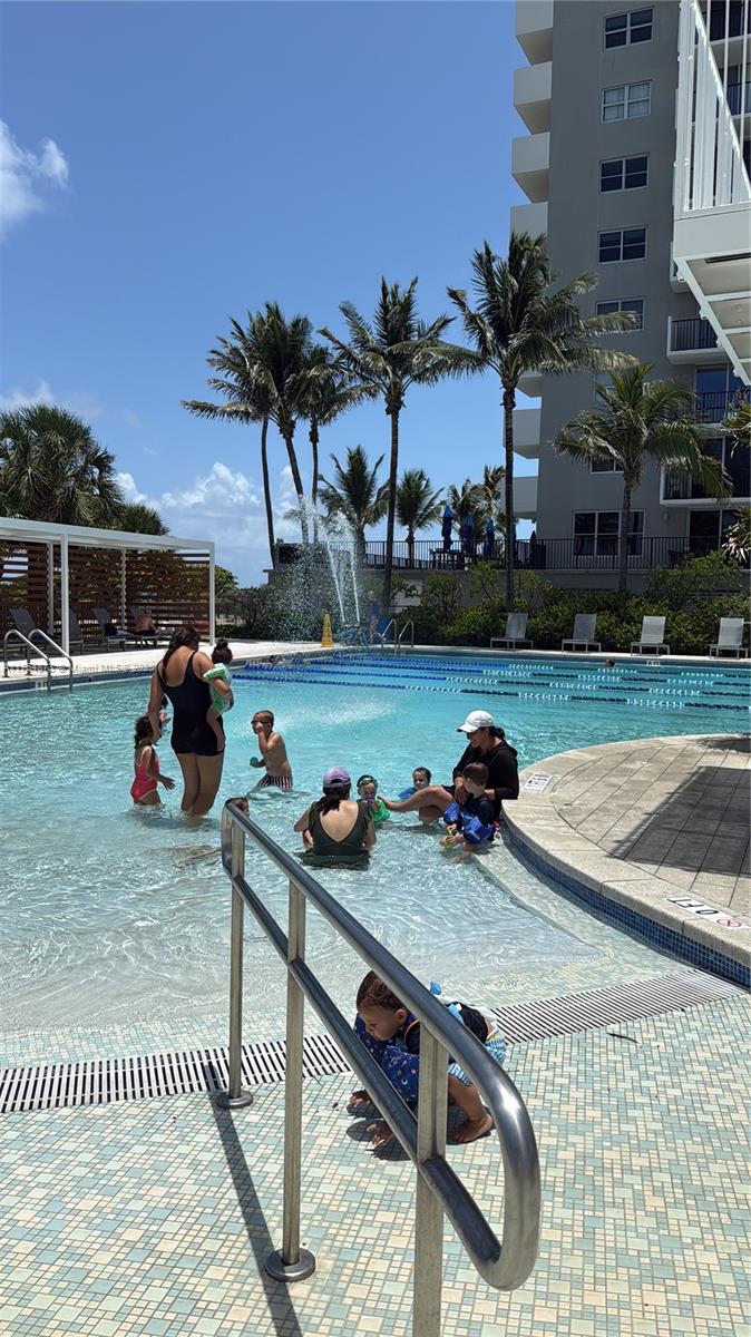9225 Collins Avenue, Unit 503 Surfside, FL 33154 - Photo 35 of 37 a view of a terrace with sitting area
