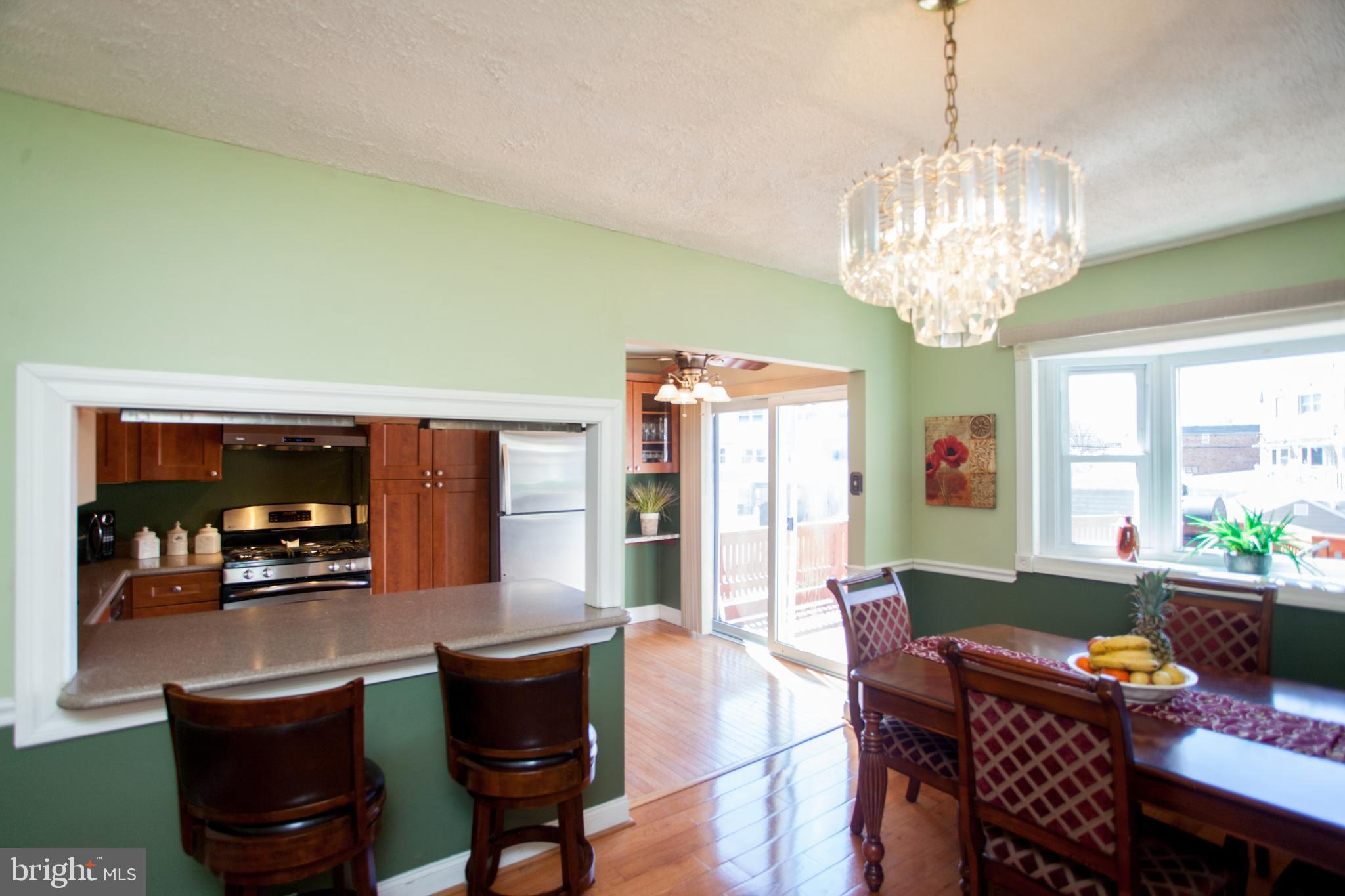 12516 Chilton Road Philadelphia, PA 19154 - Photo 12 of 73 Dining Room into Kitchen, Sliders to Rear Deck