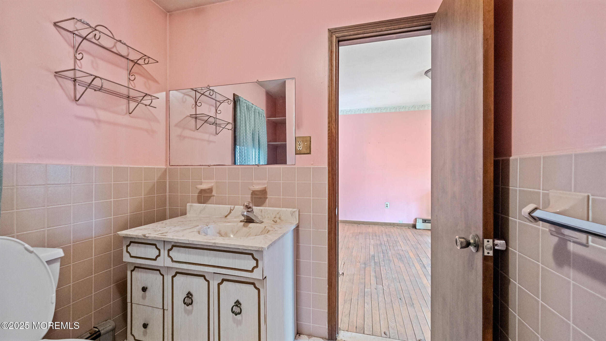4641 Crosswicks Hamilton Square Road Robbinsville, NJ 08691 - Photo 30 of 58 a bathroom with a sink a vanity and a mirror