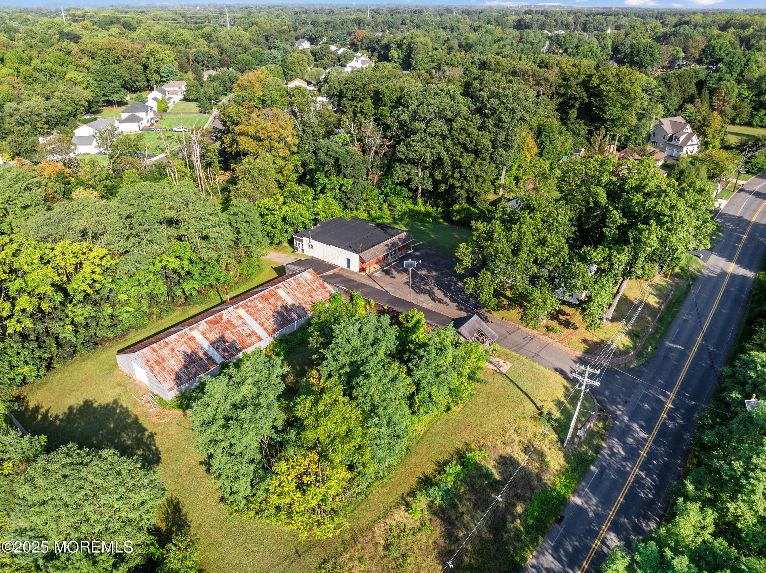 4641 Crosswicks Hamilton Square Road Robbinsville, NJ 08691 - Photo 3 of 58 an aerial view of residential house with outdoor space and trees all around
