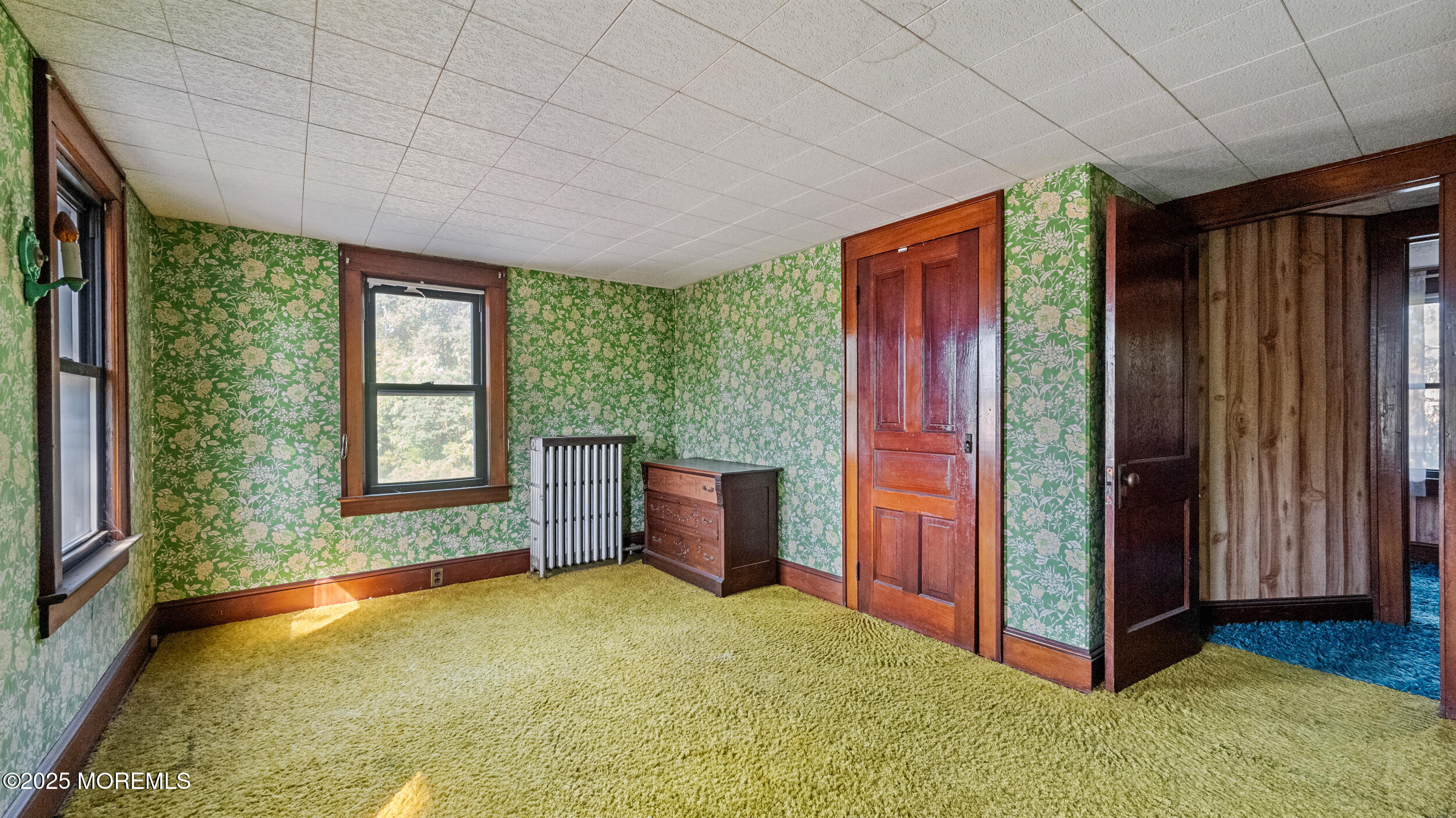 4641 Crosswicks Hamilton Square Road Robbinsville, NJ 08691 - Photo 32 of 58 a view of an empty room with a fireplace and a window