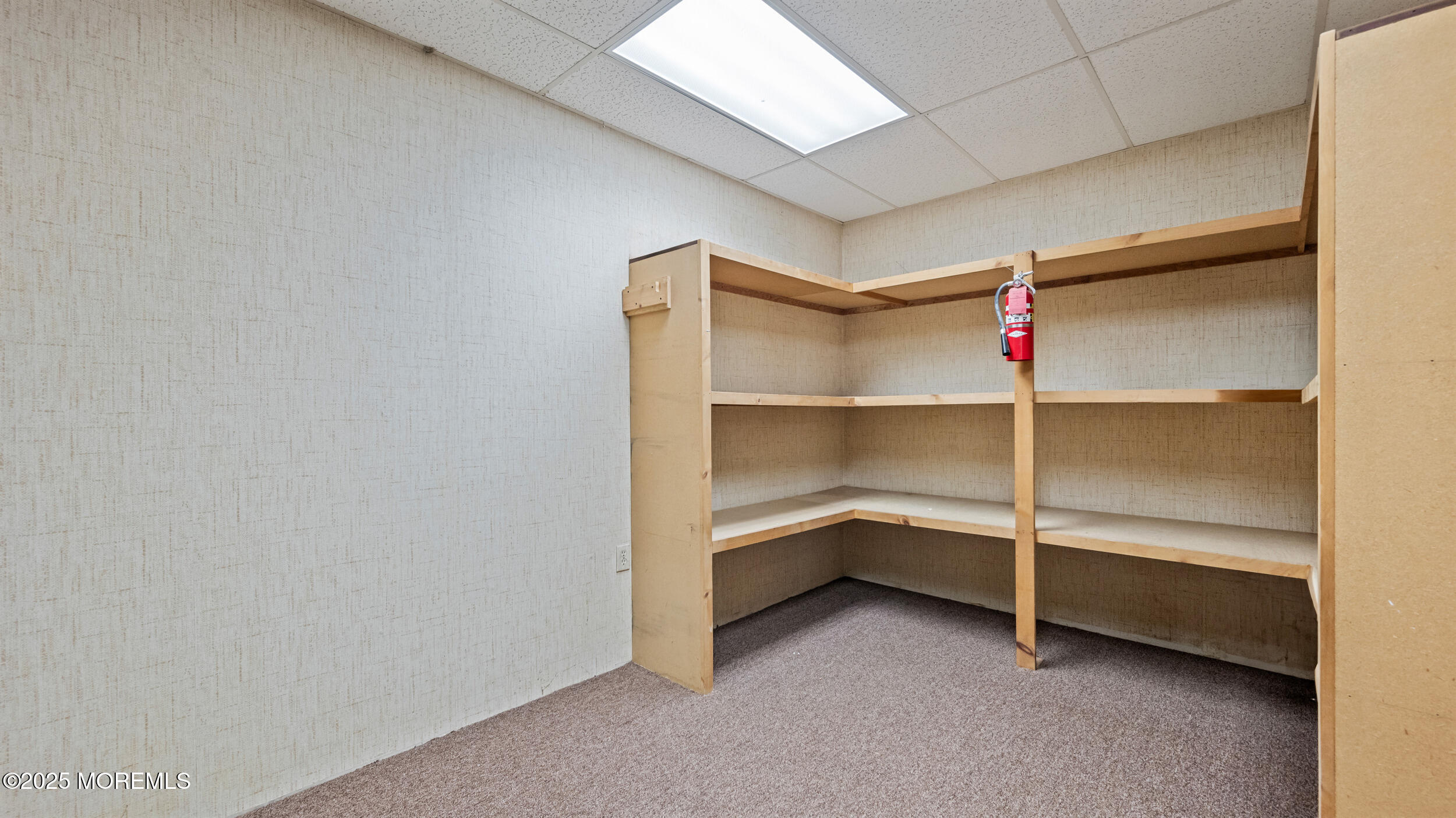 4641 Crosswicks Hamilton Square Road Robbinsville, NJ 08691 - Photo 49 of 58 a view of an empty room with a fireplace