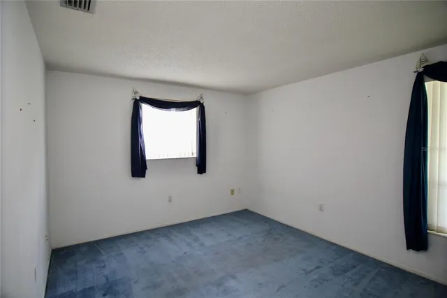 an empty room with window