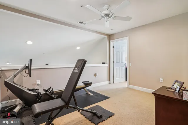 a view of a workspace with gym equipment