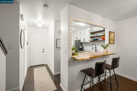 a view of bathroom with sink and mirror
